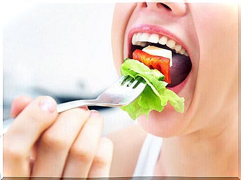 Woman eating a salad