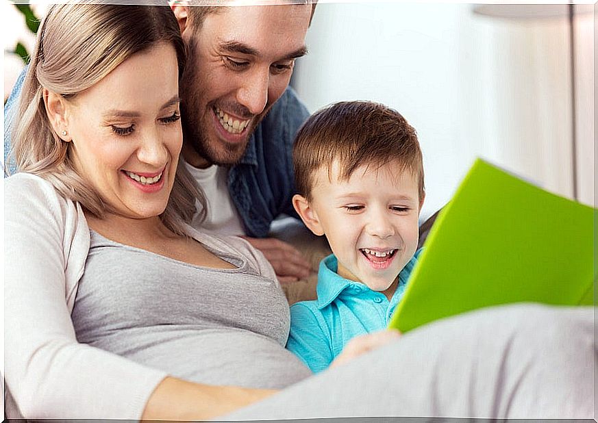 Happy pregnant mother with her family.