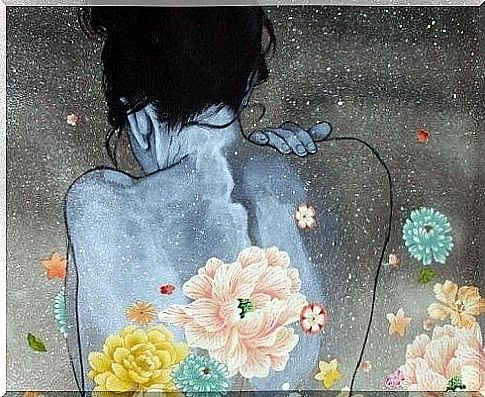 Woman from behind with flowers.