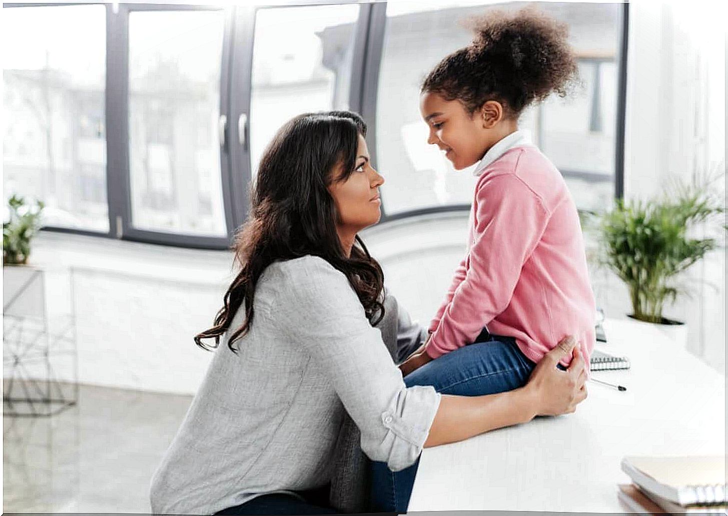 Mother and daughter talking.